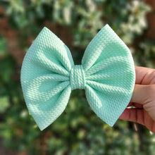 Load image into Gallery viewer, Savannah Bow on Nude Nylon